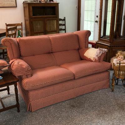 Red check love seat.  Good condition 