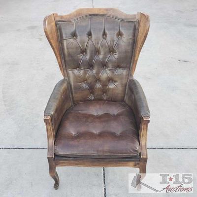 8128: Wood and Leather Armchair
Dark leather chair. 18