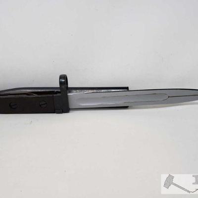 2266	

Bayonet w/ Scabbard
Blade stamped stamped 11, 1958. Measures 8
