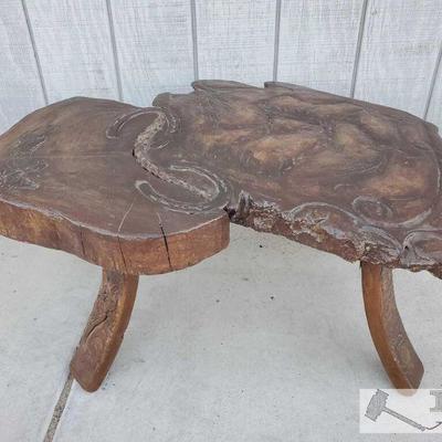 3703	

"Round Horses" By Cliff Larson Carved Wood Table
Measures approx. 33" x 24" x 14"