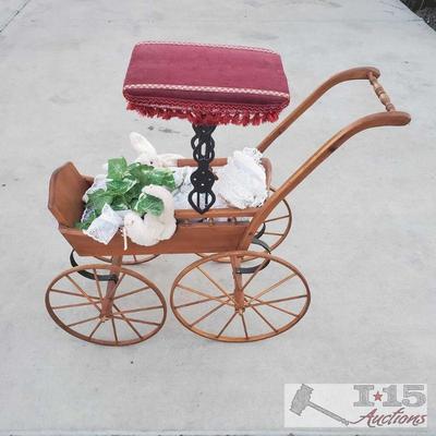 8127: Decorative Antique Baby Carriage. Small baby carriage, baby doll and toy bunnies. Red velvet shade.