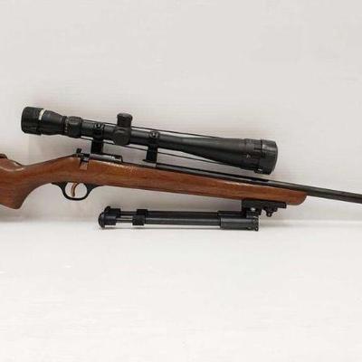 765:  ColtColteer .22mag Bolt Action Rifle with Scope and Stand. 	
Serial number: n/a Barrel length: 24