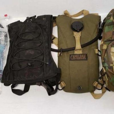 7035: 3 Hydration Backpacks with 4 Brand New Water Bag and H2O Hose Outlets
