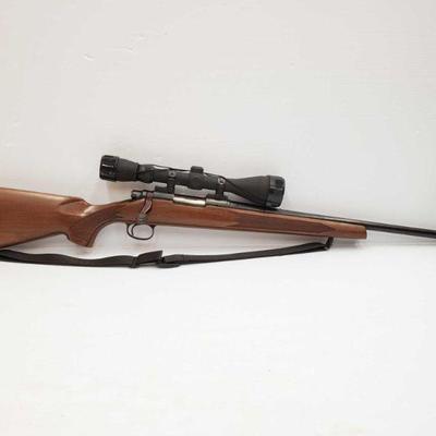 705:  Remington 700 .243 Win Bolt Action Rifle With Scope. Serial Number: C6416613. Barrel Length: 22
