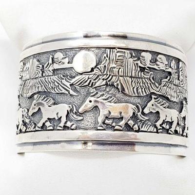 183: Signed by Artist Randy Billy Inside & Out Double Story Teller Sterling Silver Cuff Bracelet , 106.4g
Weighs approx 106.4g
Sterling...