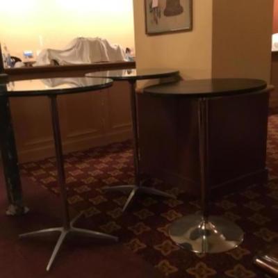 Pedestal Standing Bar Tables - lot 3 . (2 are 42in h and diameter=29in with glass top. 1 has no glass top and measures 40in h x 29 in...