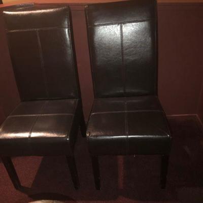 2 Black Leather Parsonâ€™s chairs.