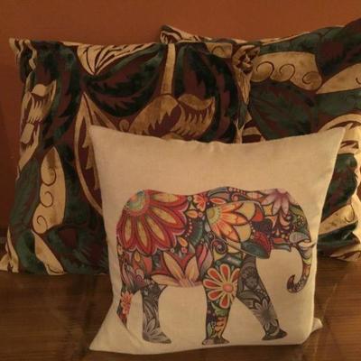 High end throw pillows. 2 Velvet and Canvas And 1 Elephant print. A lot of 3.