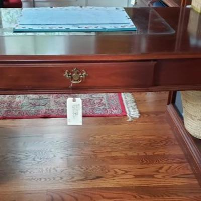 Mahogany bookcase with desk $225