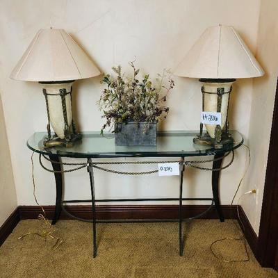 #205 ($200) HEAVY hall/console table with glass top (removable) and metal/brass base. Rope theme. 59