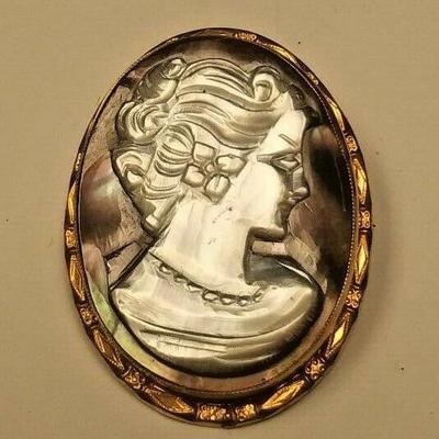 https://www.ebay.com/itm/114233999874	AB0360 USED VINTAGE COSTUME JEWELRY BROOCH CAMEO 12 KT GOLD FILLED MADE BY IN	 $20.00 
