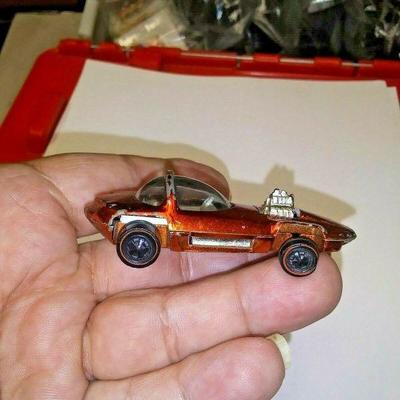 https://www.ebay.com/itm/124205211570	AB0401 USED VINTAGE DIECAST 1967 ORANGE HOTWHEELS SILHOUETTE TOY CAR RED LINE 	 Auction 
