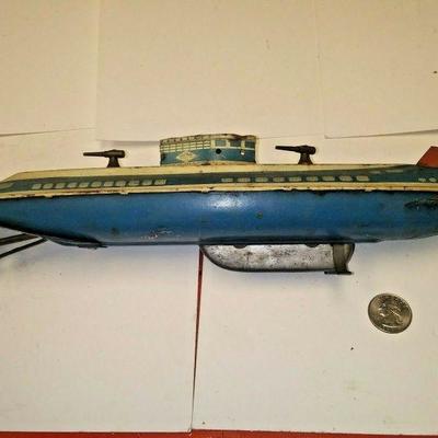 https://www.ebay.com/itm/124205236274	AB0398 RARE USED VINTAGE 1940s WOLVERINE DIVING SUBMARINE S-88 TIN WIND-UP TOY	 Auction 
