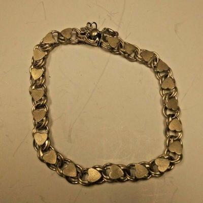https://www.ebay.com/itm/114234004059	AB0377 USED VINTAGE 9.25 STERLING SILVER 7 INCH HEART CHARM BRACELET CONDIION NOTE PICTURES 7...