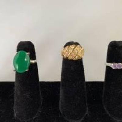 Lot of 3 Costume Rings. Ring with Green Stone Signed Vogue