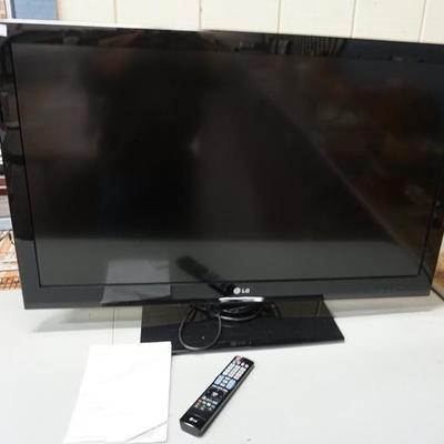1159	LG FLAT SCREEN TV WITH REMOTE-42 IN
