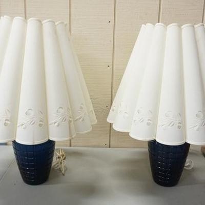 1124	PAIR OF BLUE GLASS LAMPS W/CUT OUT SHADES
