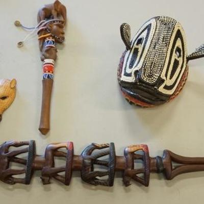 1060	LOT OF AFRICAN CARVINGS, MASK, AND CARVED ELEPHANT WALKING STICK

