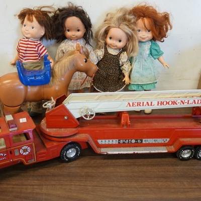 1029	LOT NYLINT FIRE TRUCK, TOY HORSE, AND FOUR DOLLS
