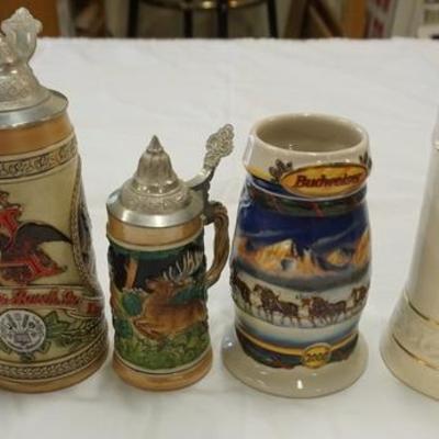 1082	LOT OF COLLECTIBLE STEINS

