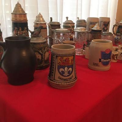 Lidded and stoneware German steins