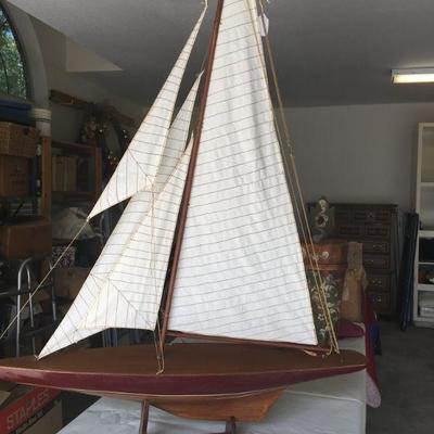 Three-foot wooden and cloth sailboat model