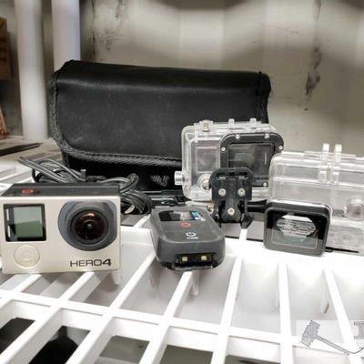 4151	

Go Pro Hero 4
Includes 2 Cases, Travel Carrier, Remote, And Cords