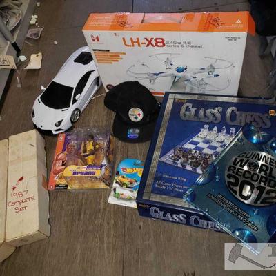 4158	

LH-X8 Drone, Baseball Cards, Kobe Bryant Action Figure, Hot Wheel, Rc Lamborghini, And More
Also Includes Glass Chess, World...