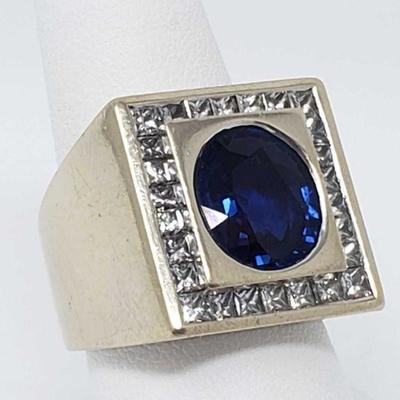 610: 18k Gold Ring With Diamonds And Sapphire, 26.5g
Size 9. Sapphire Approx 4ct. Diamonds Approx 1/32ct.