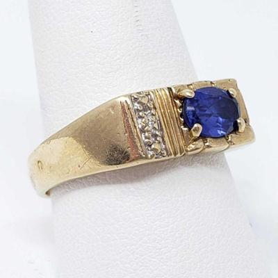 702	

10k Gold Ring With Sapphire And Diamonds, 3.7g
Size 10