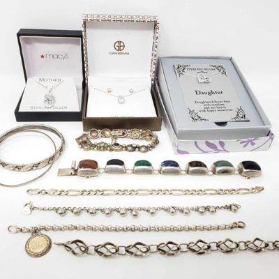 818	

3 Sterling Silver Necklaces W/ Pendants And 8 Sterling Silver Bracelets
Necklaces Measurements Range Bracelets Measurements Range