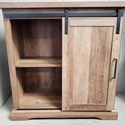 2127	

Wooden Cabinet With Barn Door
Measurements Approx 21.5