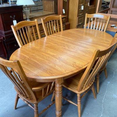 2551	

Wooden Dinning Room Table w/ Extra Leaf
Wooden Dinning Room Table w/ Extra Leaf Approx. 6â€™5â€x3â€™6â€x2â€™6â€
