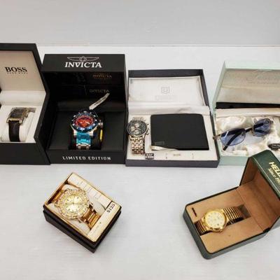 1007	

6 Watches In Boxes
Brands Include Helbros, Elgin, Invicta, Boss Hugo Boss, Frondini, QBOS