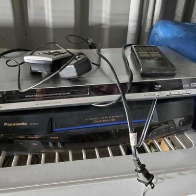 7323	

Panisonic DVD Player and VHS Player
DVD Player Model No: DVD-S29 VHS Player Model No: PV-8450