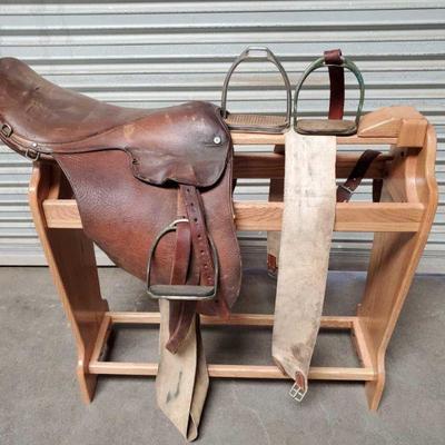 2137	

English Saddle By Nicholas Brand, 2 Stirrups, 1 Front Cinch
(Does Not Include Saddle Rack)