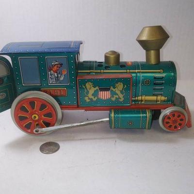 https://www.ebay.com/itm/124211558811	BU3054 1950s VINTAGE PRESSED METAL TIN STEAM TRAIN #3191 BATTERY OPPERATED TWO D CELLS note...