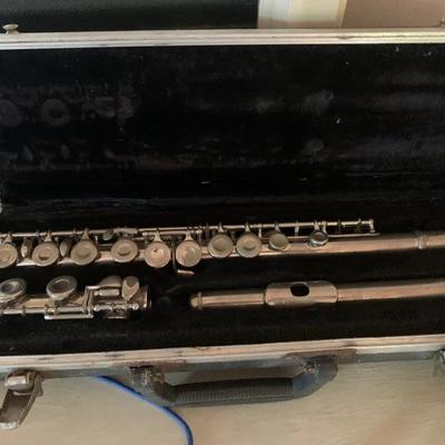 $55. Flute in case 