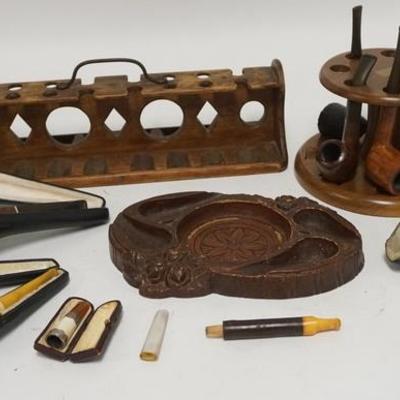 1182	LOT OF PIPES & PIPE HOLDERS, TWO WOODEN PIPE HOLDERS, A PIPE TRAY, NINE PIPES INCLUDING TWO MEERSCHAUM, A PIPE STEM & TWO...
