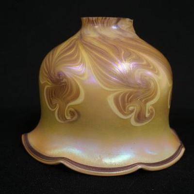 1067	VANDERMARK GOLD LUSTER SHADE  W/ FEATHERED DESGIN, FITTER RIM IS MISSHAPEN, 2 1/4 IN FITTER, 6 3/4 IN FLARED DIAMETER, 5 1/2 IN H 
