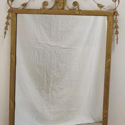 1286	MIRROR IN GILT FRAME W/ LEAF & SHELL CREST, OVERALL DIMENSIONS 29 IN X 50 IN 
