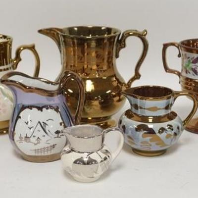 1089	8 PIECES OF LUSTERWARE COPPER & SILVER LUSTER, 7 CREAMERS & A CHALICE, TALLEST IS 5 3/4 IN 
