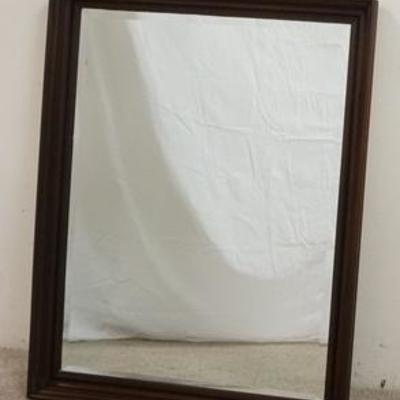 1285	LARGE BEVELED MIRROR IN A WALNUT FRAME, WIRED TO HANG VERTICAL OR HORIZONTAL, OVERALL DIMENSIONS 26 1/2 IN X 34 1/2 IN 
