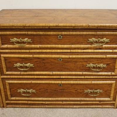 1151	FOLK ART SMOKED BAMBOO AND OAK 3 DRAWER DRESSER. HAS A BURNED IN DESIGN ON THE OAK TOP.
