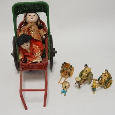 1300	GROUP OF 4 DOLLS IN RICKSHAWS, LARGEST IS 15 1/2 IN L 
