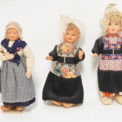 1304	GROUP OF THREE DOLLS IN CONTINENTAL COSTUMES, TALLEST IS 10 IN 
