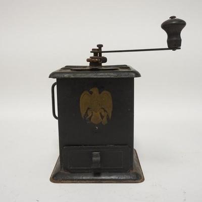 1086	TIN COFFEE GRINDER HAS LITHO OF AN AMERICAN EAGLE, 10 1/4 IN H 
