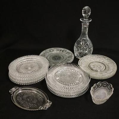 1266	18 PIECE CLEAR GLASS LOT; LOT INCLUDES A 12 1/4 IN CUT CRYSTAL DECANTER, FOUR MISS AMERICA PLATES, 2 SANDWICH PATTERN PLATES ETC. 
