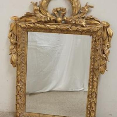 1274	MARQUIS GILT BEVELED MIRROR W/ WREATH CREST, 25 IN X 34 IN OVERALL
