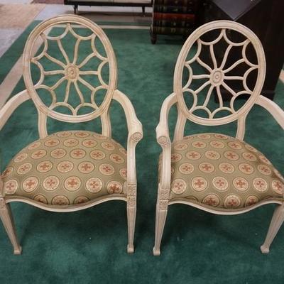 1031	PAIR OF WHEEL BACK CARVED ARMCHAIRS PAINTED WHITE
